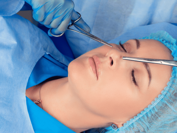 A woman getting a rhinoplasty surgery in Thailand