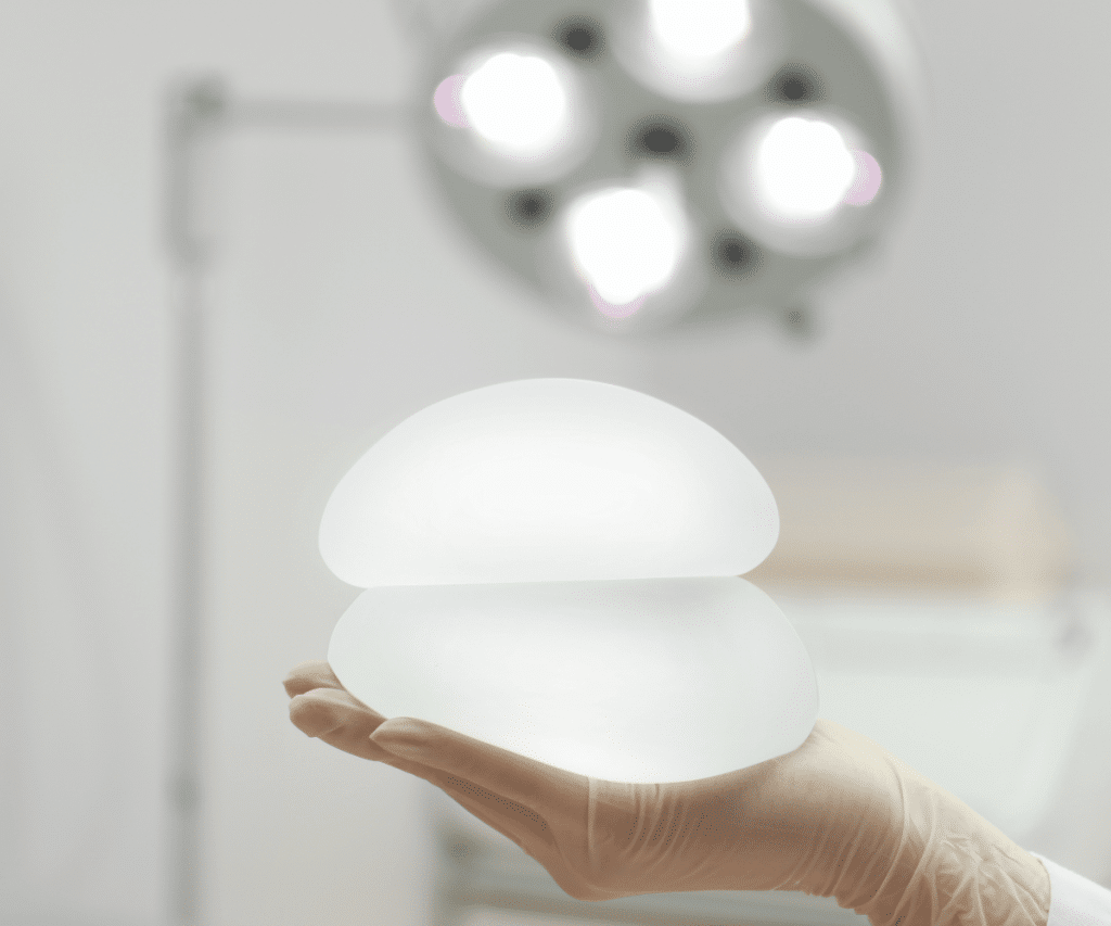 An image of two breast implants on the hand